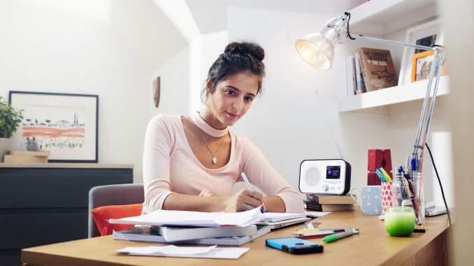 PHOTOGRAPHY-Young-woman-studying-Radio.jpg