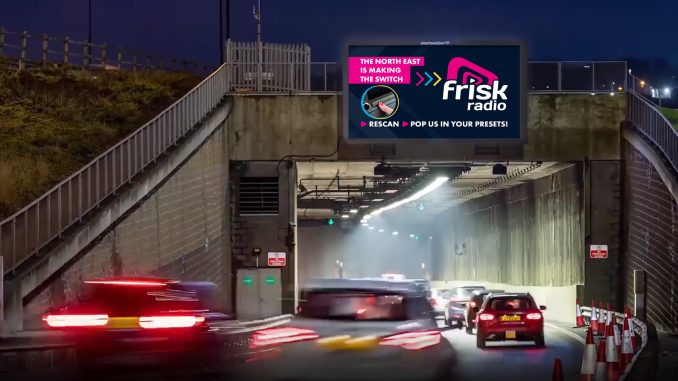 Frisk-on-Billboard-above-Tyne-Tunnel-Entrance-scaled.jpg