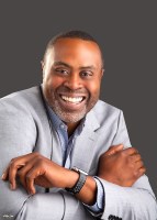 kennythomas-143x200.jpeg